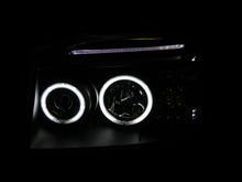 Load image into Gallery viewer, ANZO 2001-2004 Nissan Frontier Projector Headlights w/ Halo Black (CCFL)