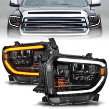 Load image into Gallery viewer, ANZO 2014-2021 Toyota Tundra LED Crystal Headlights w/ Switchback Black Housing w/ DRL