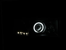 Load image into Gallery viewer, ANZO 1994-2001 Dodge Ram Projector Headlights w/ Halo Black